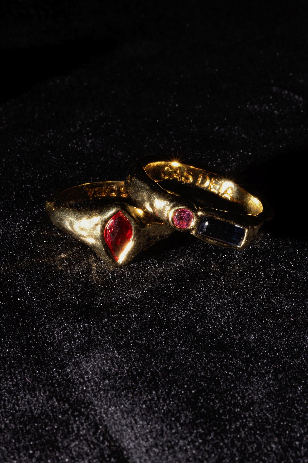 CAS DEIÀ GOTA RING RED with other CAS DEIÀ rings, gold finish