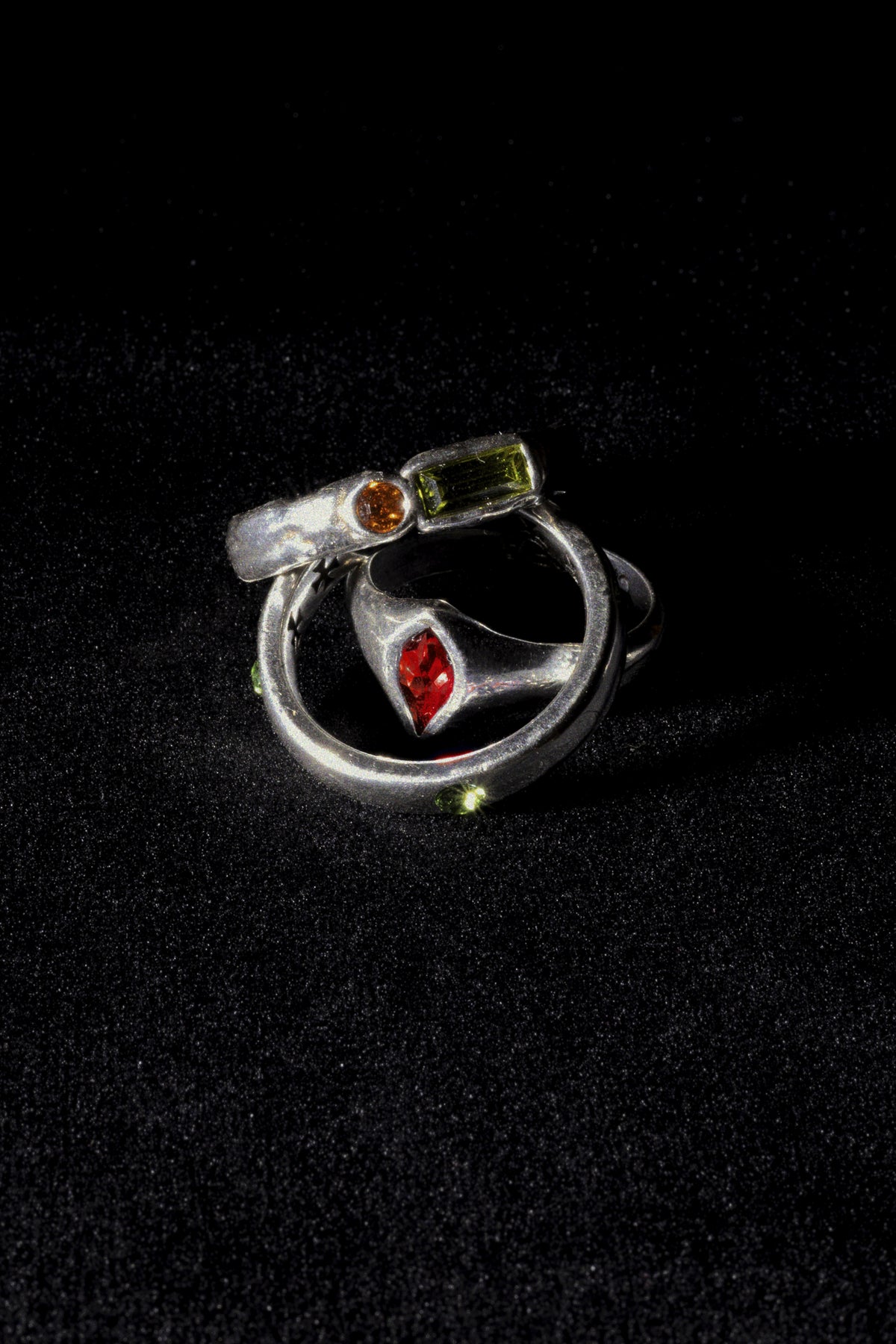 CAS DEIÀ GOTA RING RED with other CAS DEIÀ rings, silver finish